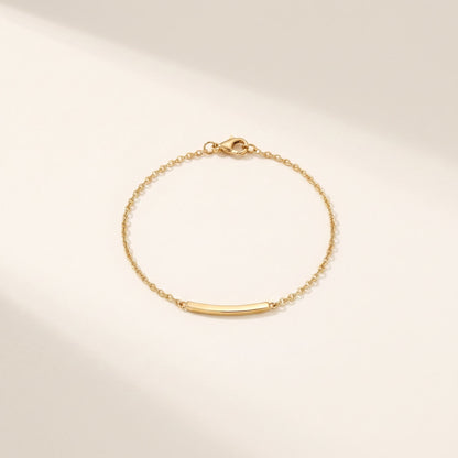 Bracciale Filo: catena sottile con barretta lucida e moschettone, acciaio 316L PVD oro