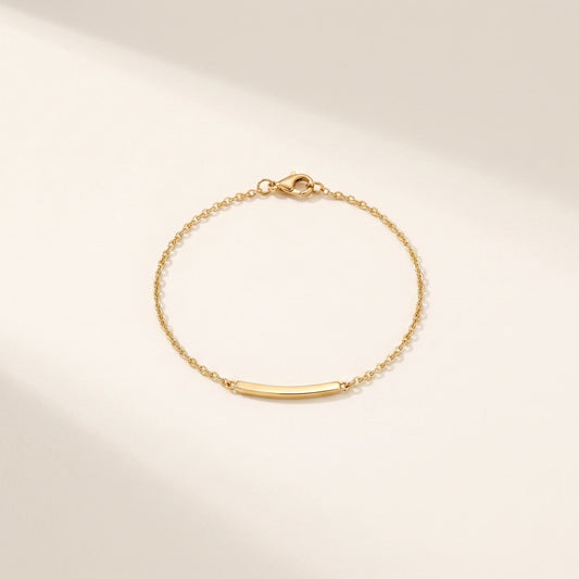 Bracciale Filo: catena sottile con barretta lucida e moschettone, acciaio 316L PVD oro