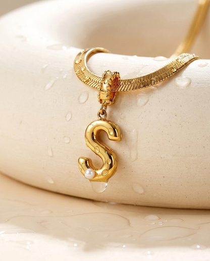 Collana Alma bagnata, gocce d'acqua sull'acciaio 316L con finitura PVD