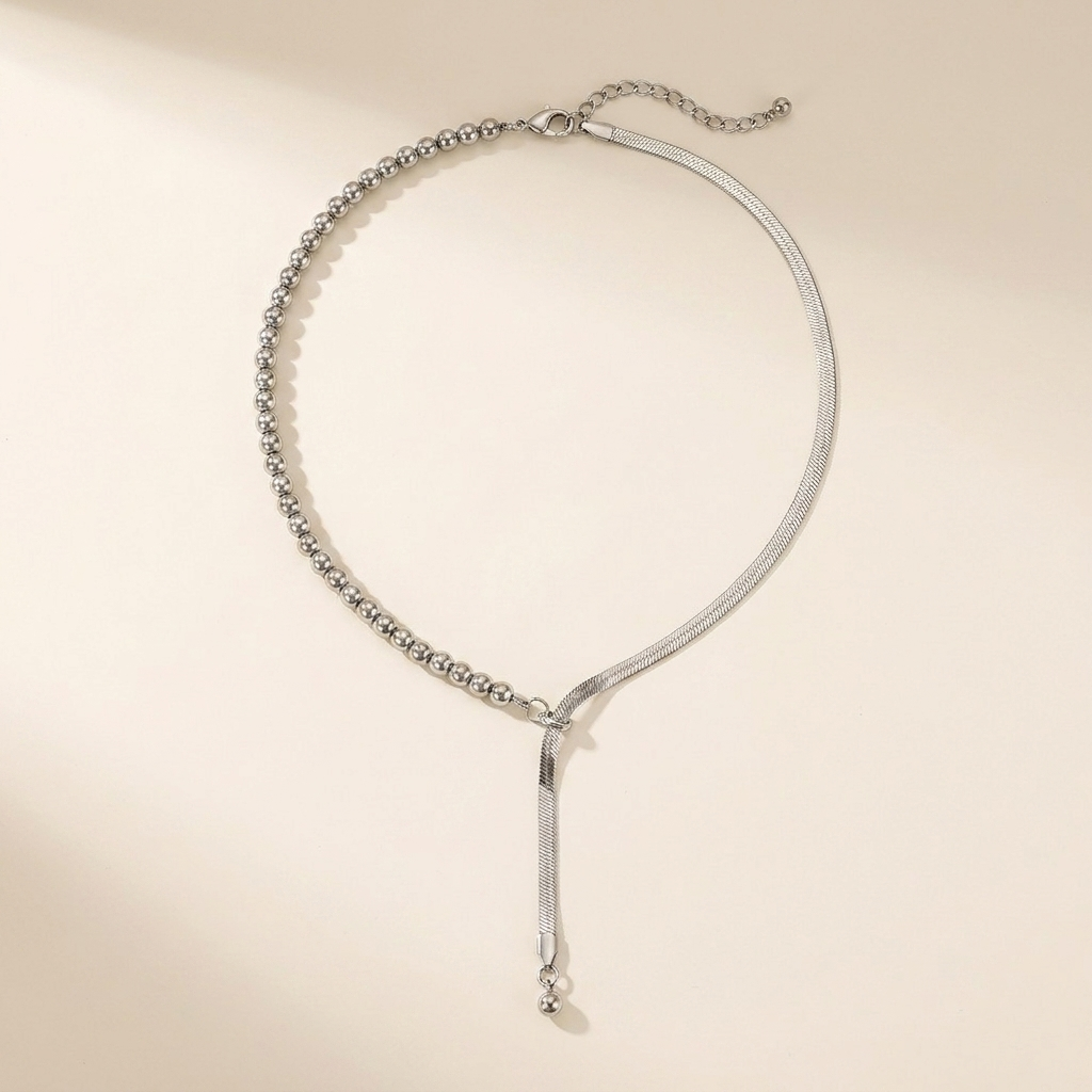 Collana Neo unisex sfere e herringbone in acciaio argento