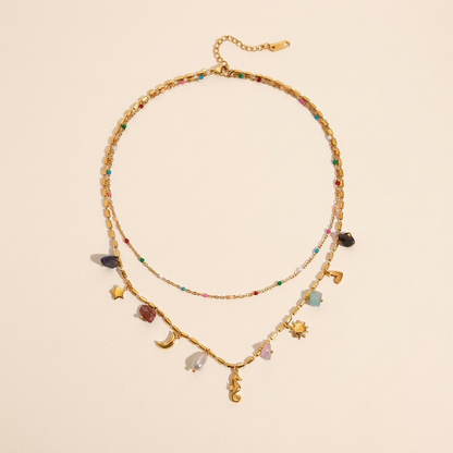 Collana Riva doppia con perline smaltate e charm, acciaio 316L PVD oro