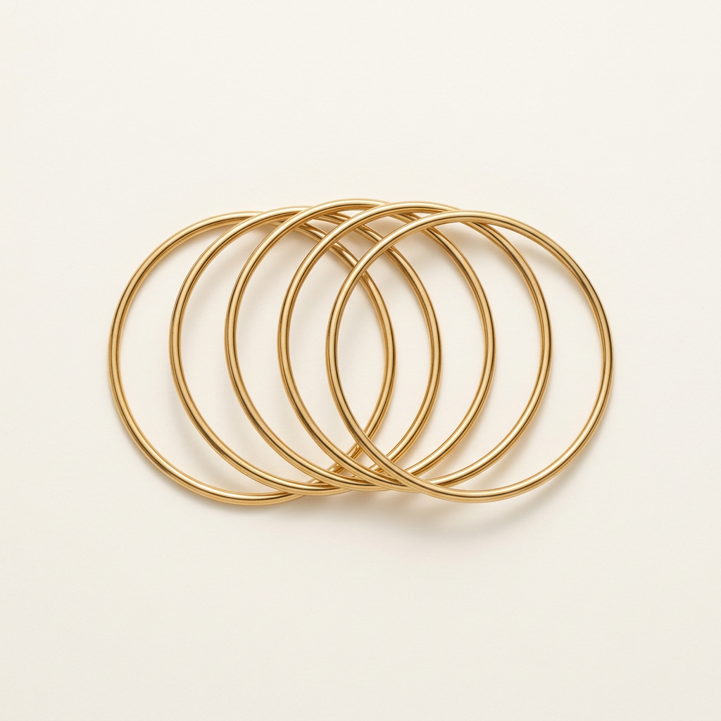 Mira, set di cinque bracciali rigidi sottili